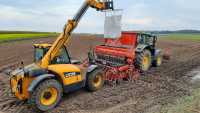 John Deere 6195M i Kuhn Sitera 3030