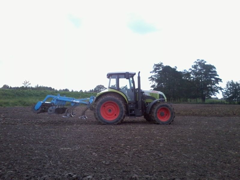 Claas Arion 610 Cis + Farmet 3,0m